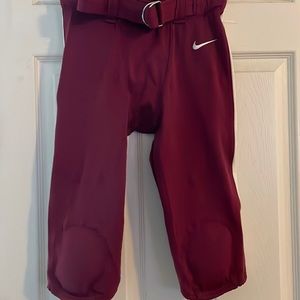 Mens size small athletic pants, burgundy with off-white stripe.